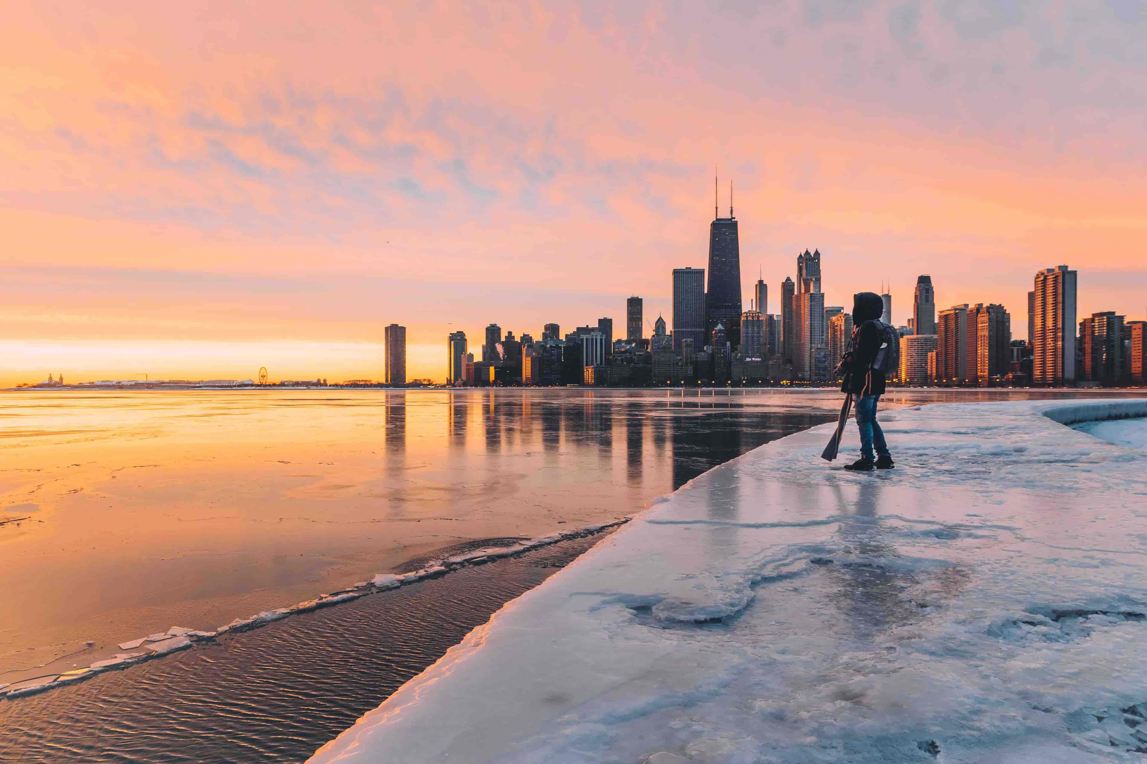 A sunrise in Chicago waterfront with myself standing on the edge of a pathway